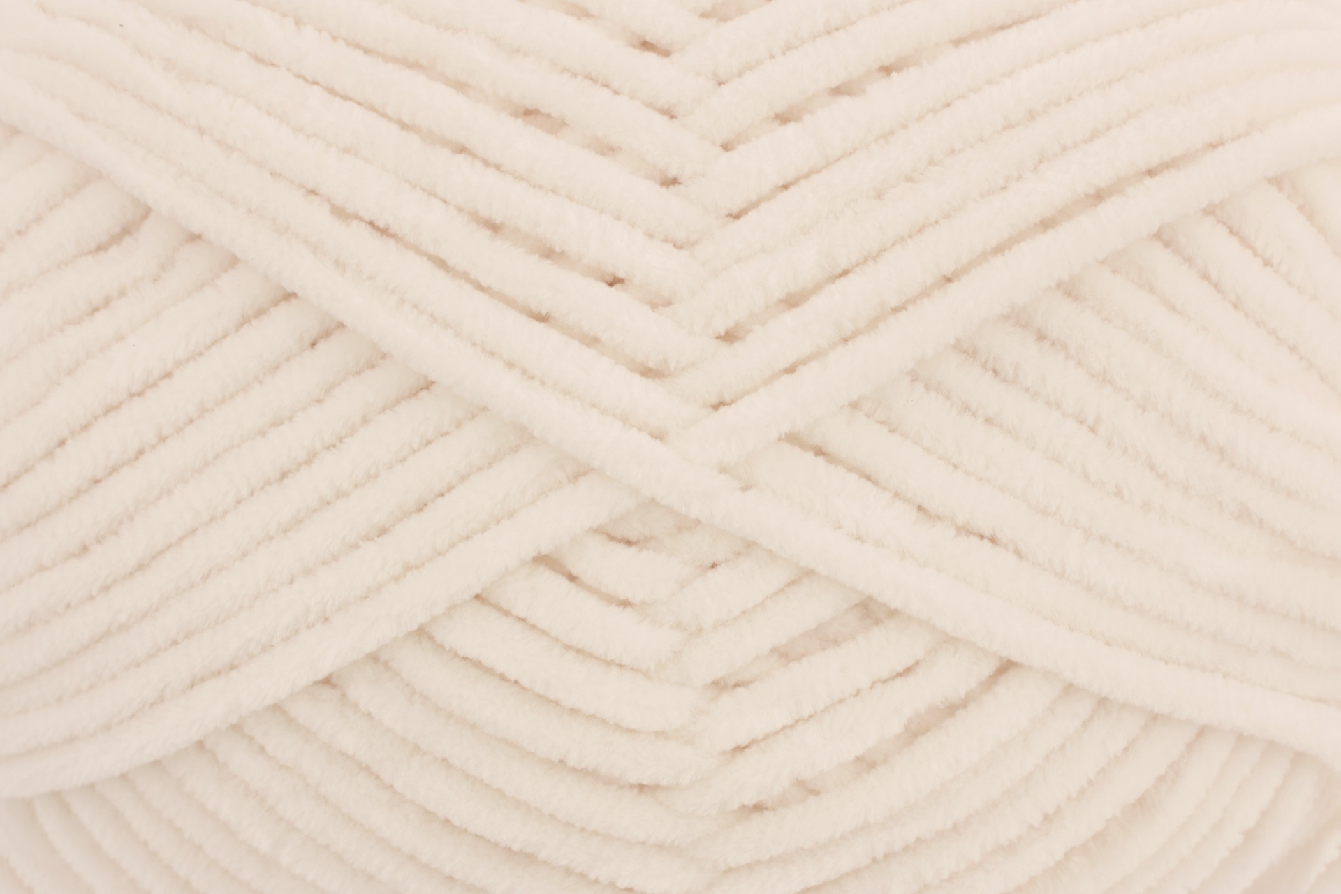 Novelo de lã creme com textura macia