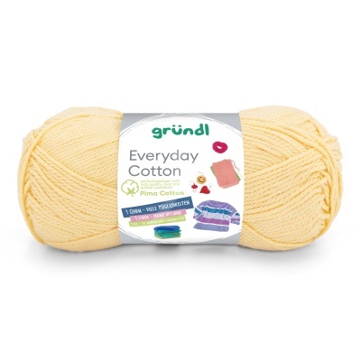 Novelo de fio de algodão amarelo claro com embalagem do produto grundl Everyday Cotton