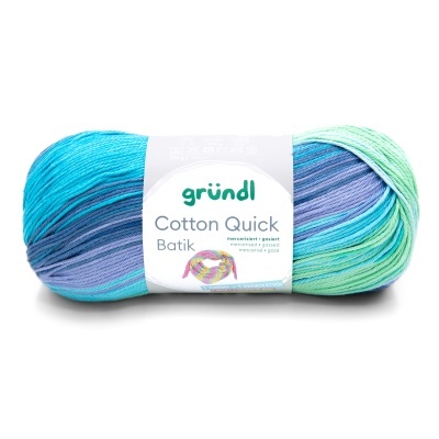 Novelo de fio de algodão colorido com rótulo branco da marca gründl