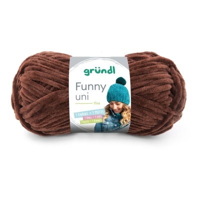 Novelo de fio de lã castanho com etiqueta da marca gründl