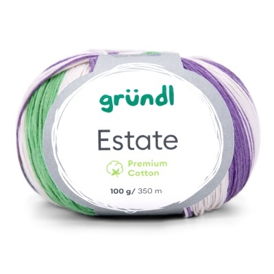 Novelo de fio de algodão multifacetado com etiqueta branca e texto verde e cinza.