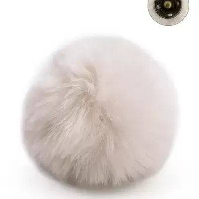 Pompon redondo creme de pelo macio com fecho metálico