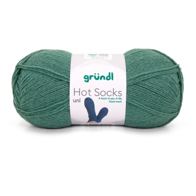 Rolo de lã verde gründl Hot Socks com rótulo branco