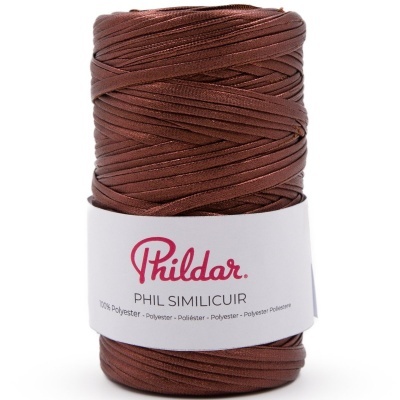 Rolo de fio couro sintético marrom com etiqueta Phildar