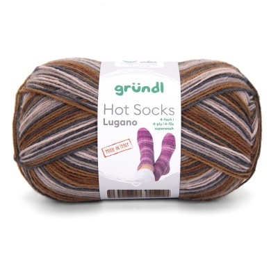 Novelo de lã para meias com padrão às riscas em tons terra e rótulos. 