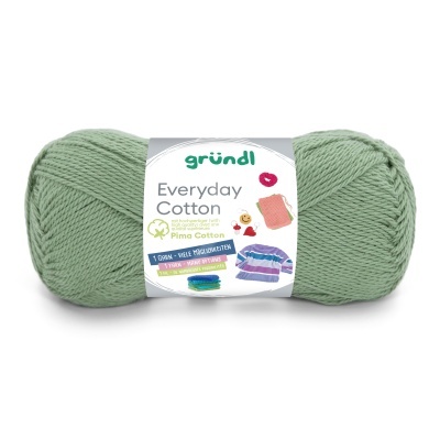 Novelo de fio verde de algodão com etiqueta branca da marca gründl