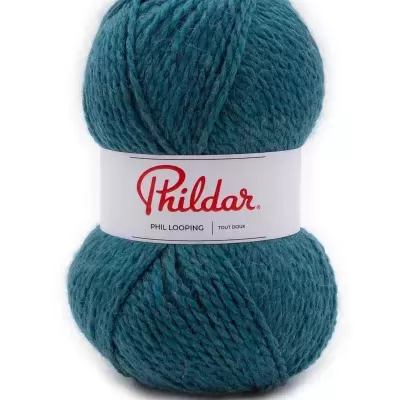 Novelo de lã azul turquesa da marca Phildar com etiqueta branca