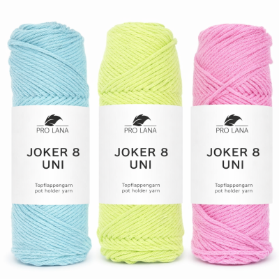 Três novelos de fio colorido com etiquetas PRO LANA JOKER 8 UNI