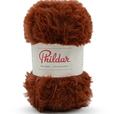 Novelo de fio castanho felpudo com etiqueta Phildar