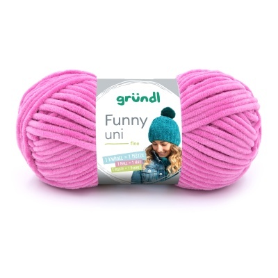 Skein of pink yarn with gründl Funny uni fine label and teal hat image
