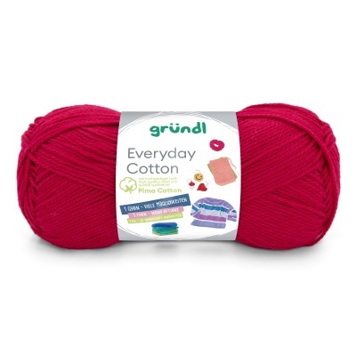 Novelo de fio de algodão vermelho com etiqueta branca e texto em inglês.