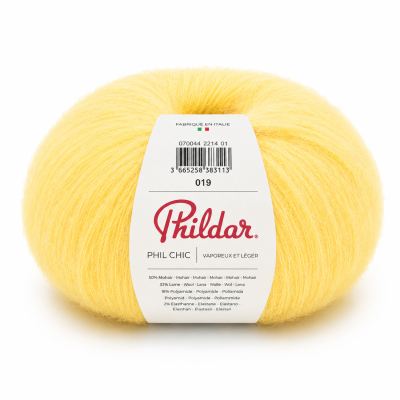 Novelo de fio amarelo claro com etiqueta branca da marca Phildar