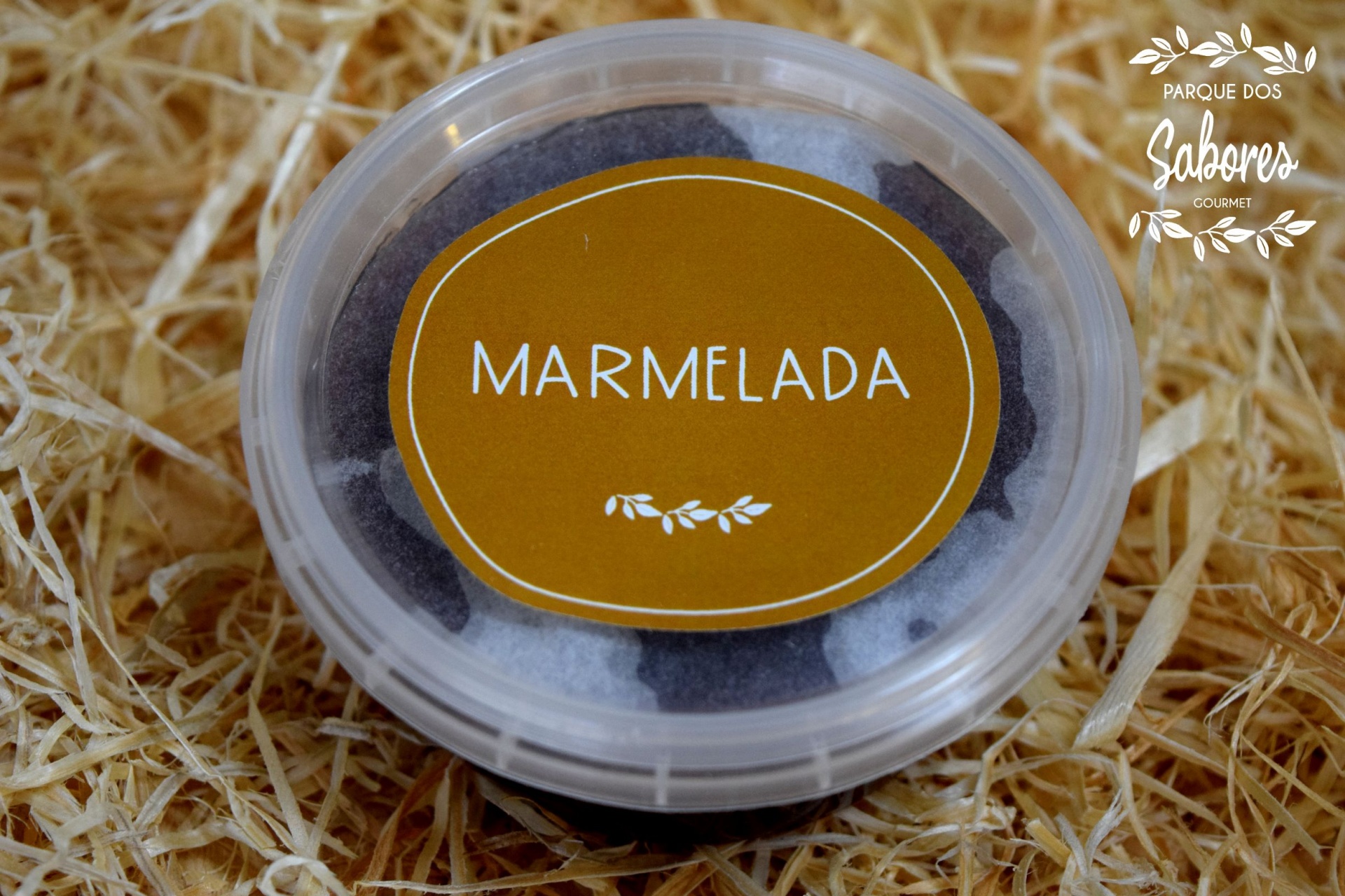 Marmelada Recipiente plastico com marmelada e etiqueta amarela