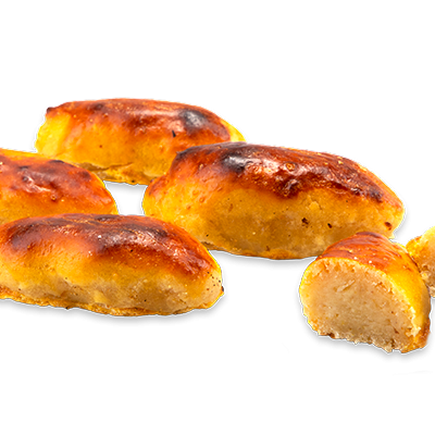 Seis pãezinhos dourados assados, um cortado mostrando interior macio em fundo preto