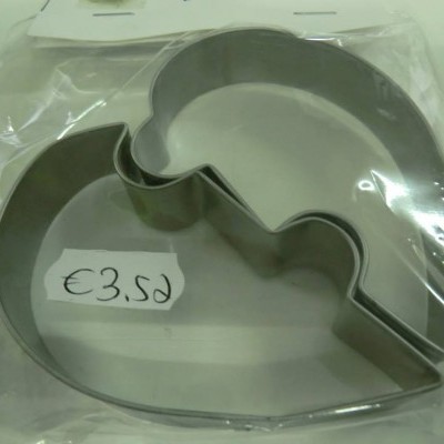 Cortadores de bolachas metálicos em forma de pomba embalados em plástico