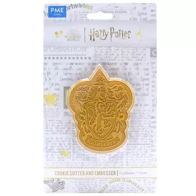 Cortador e marcador de biscoitos dourado com o emblema Gryffindor da série Harry Potter na embalagem