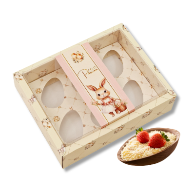 Caixa de cartão para ovos de chocolate com decoração de coelho e ovo de chocolate com recheio e morangos
