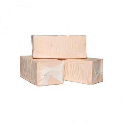 Três blocos de papel absorvente de cor creme, embalados individualmente, texturizados nas extremidades.