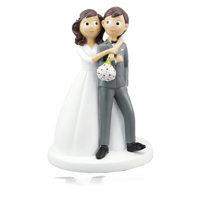 Figura decorativa de noiva e noivo para bolo de casamento.