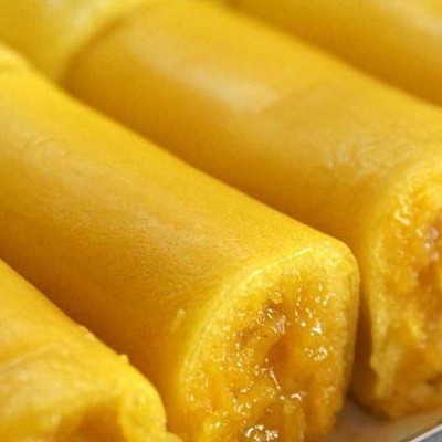 Barras amarelas cortadas com recheio de fruta