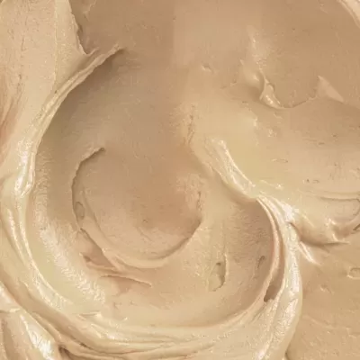 Textura creme bege suave com relevo em movimentos circulares
