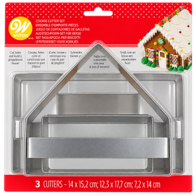 Conjunto 3 cortadores para bolachas Wilton em formas de casa de gengibre em embalagem com fundo vermelho