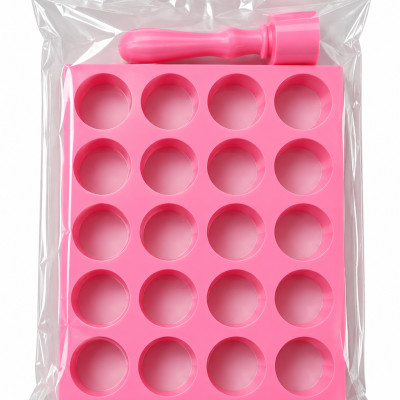Molde plástico rosa para 20 bombons com utensílio, embalado em saco plástico