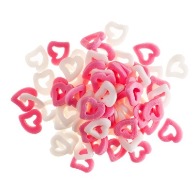 Corações plásticos rosa e brancos com orifício no centro