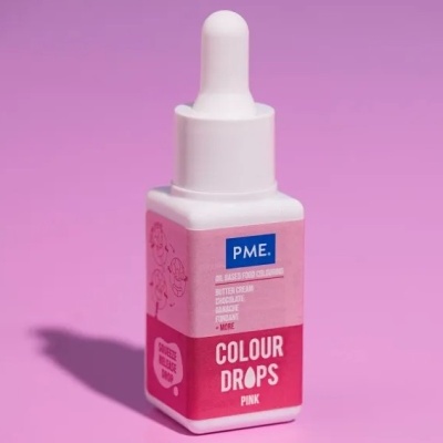 Frasco de corante alimentar cor-de-rosa PME com conta-gotas em fundo rosa
