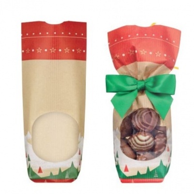 Duas embalagens natalícias de papel, uma vazia e outra com biscoitos decorativos visíveis através de janelas transparentes.