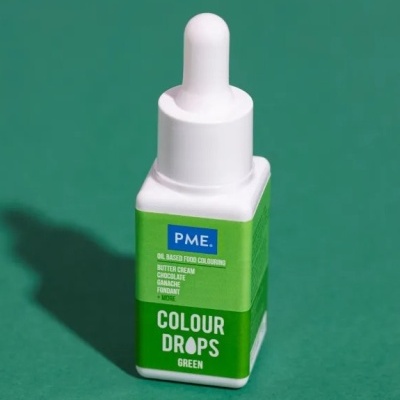 Frasco de corante alimentício PME verde com conta-gotas em fundo verde