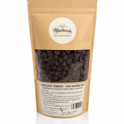 Saco de papel castanho com gotas de chocolate preto e etiqueta da marca AtlanticaSh