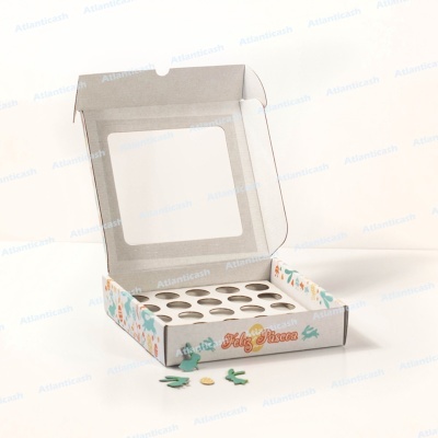 Caixa aberta para 24 cupcakes com decoração e texto FELIZ PÁSCOA