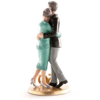 Estatueta de casal envelhecido abraçado, vestido verde água e casaco preto