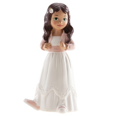 Boneca de menina em vestido branco com casaco rosa e flor no cabelo
