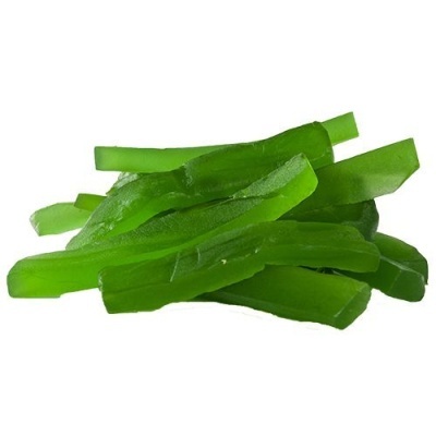 Fatias de fruta cristalizada verde com textura translúcida