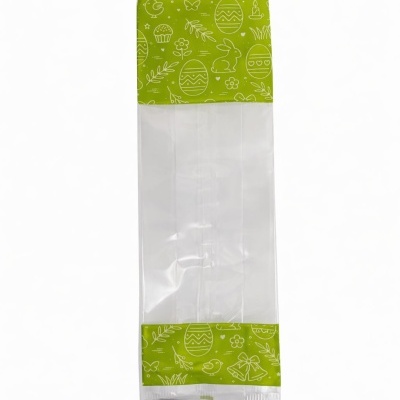 Saco plástico transparente com faixas verdes e desenhos de Páscoa