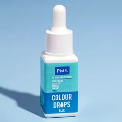 Frasco de corante alimentar azul com conta-gotas e rótulo azul e turquesa