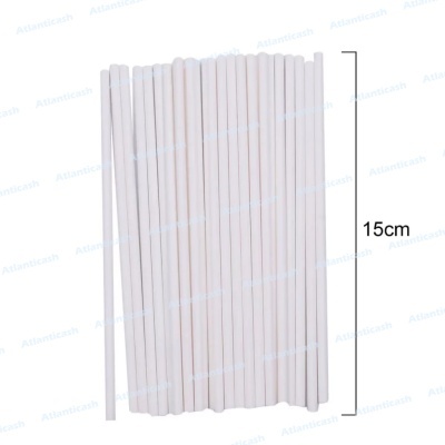 Tubos brancos compridos alinhados com medida de 15 cm ao lado