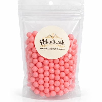 Embalagem plástica com esferas cor de rosa e etiqueta Atlanticaash
