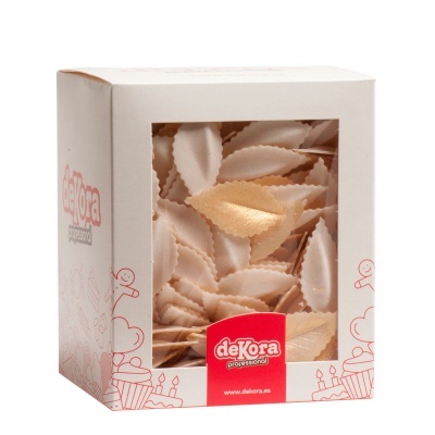 Caixa branca com folhas decorativas bege e castanho claro visíveis através de janela transparente.