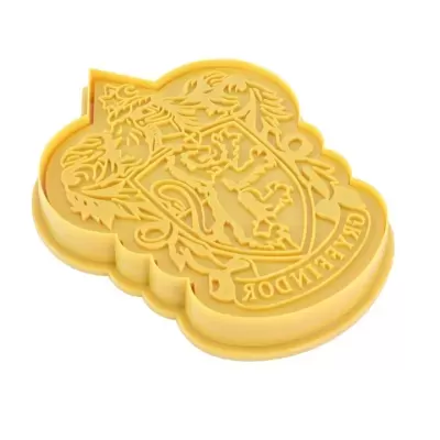 Forma de silicone amarela com brasão de Gryffindor em relevo