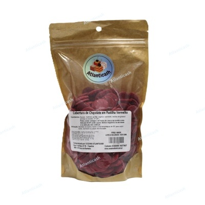 Bisnaga de chocolate em forma de pétala vermelha na embalagem castanha transparente com etiqueta branca e selo azul 'Atlánticash'