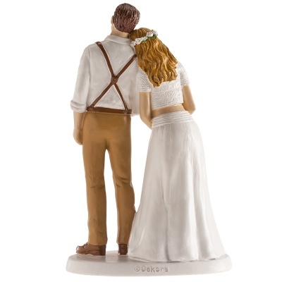 Figuras decorativas de um casal vestido de branco e castanho visto de costas