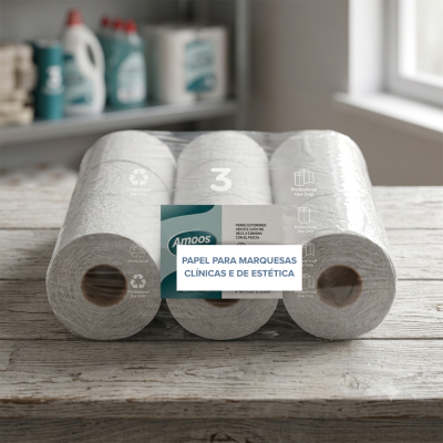 Três rolos de papel branco para marquesas embalados em plástico transparente