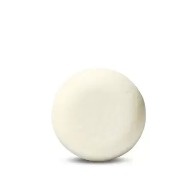 Pastilha redonda branca com superfície lisa