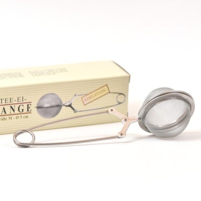 Infusor de chá metálico com malha fina e embalagem amarela