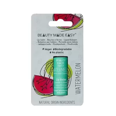 Bálsamo labial verde com embalagem de cartão decorada com melancias