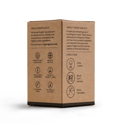 Embalagem de comprimidos efervescentes para dentes em cartão castanho com texto preto