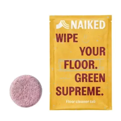 Pastilha rosa e embalagem amarela de produto limpeza chão NAIKED